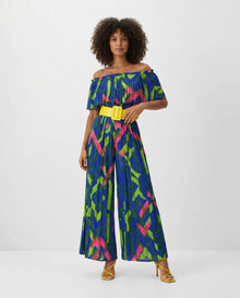 Blue Multi Print Pleated Jumpsuit - styled with yellow belt and heels